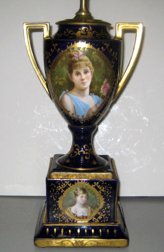 Appraisal: VIENNESE PORCELAIN PORTRAIT URN Two-handled cobalt blue grounded with portrait