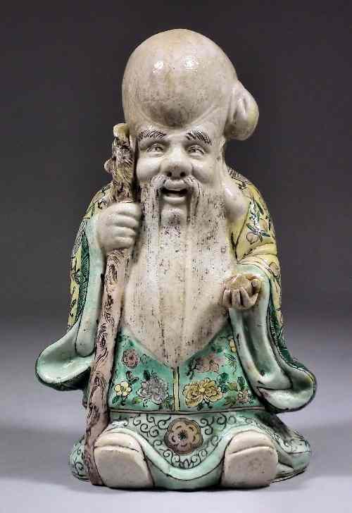 Appraisal: A Chinese porcelain figure of Shoulao painted in colours with