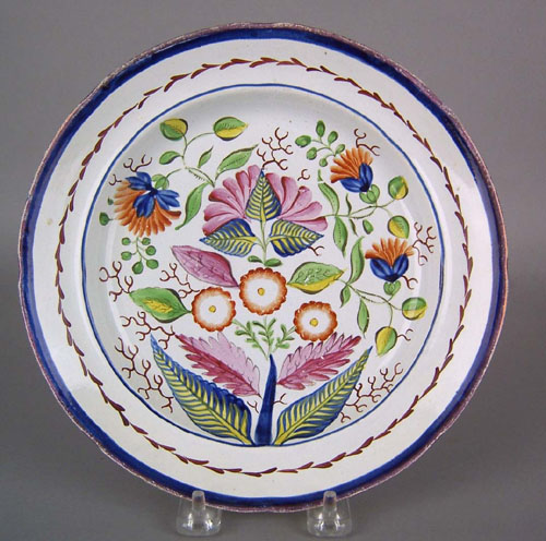 Appraisal: Unusual Gaudy Dutch plate th c in the variant pattern