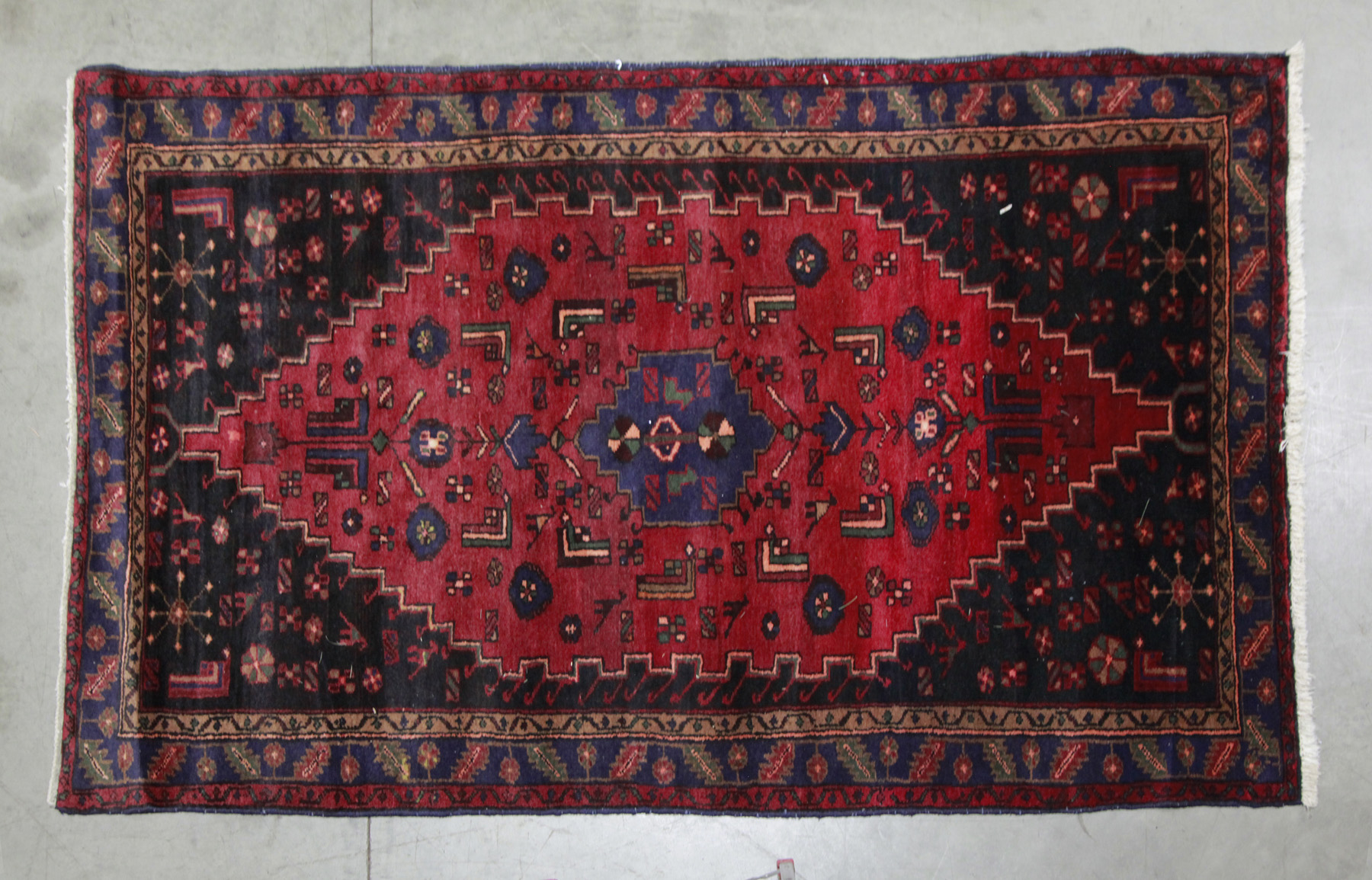 Appraisal: ORIENTAL AREA RUG Late th century Geometric and floral patterns