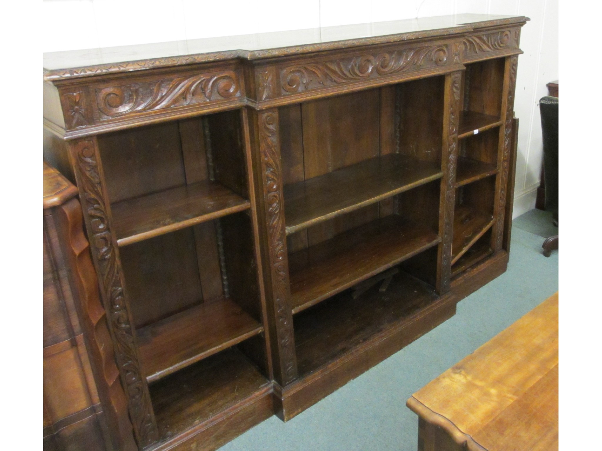 Appraisal: Victorian oak open breakfront bookcase