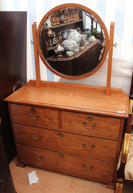 Appraisal: A LATE VICTORIAN OAK DRESSING CHEST two short and two