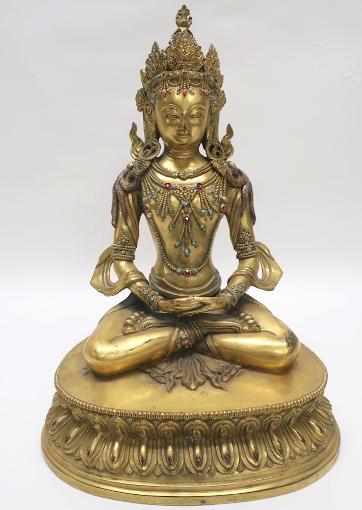 Appraisal: Sino-Tibetan Gilt Bronze Seated Guanyin Lotus base H x W