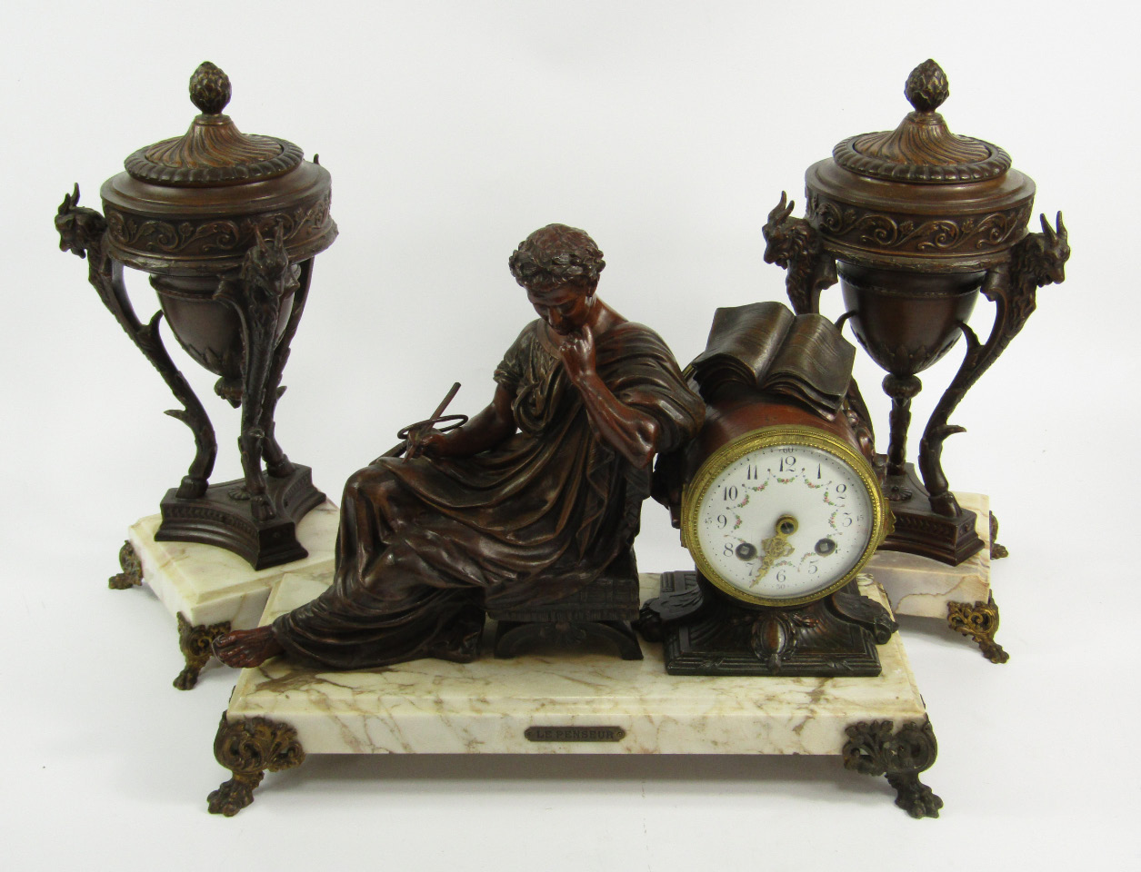 Appraisal: A late thC French bronzed spelter and marble clock garniture