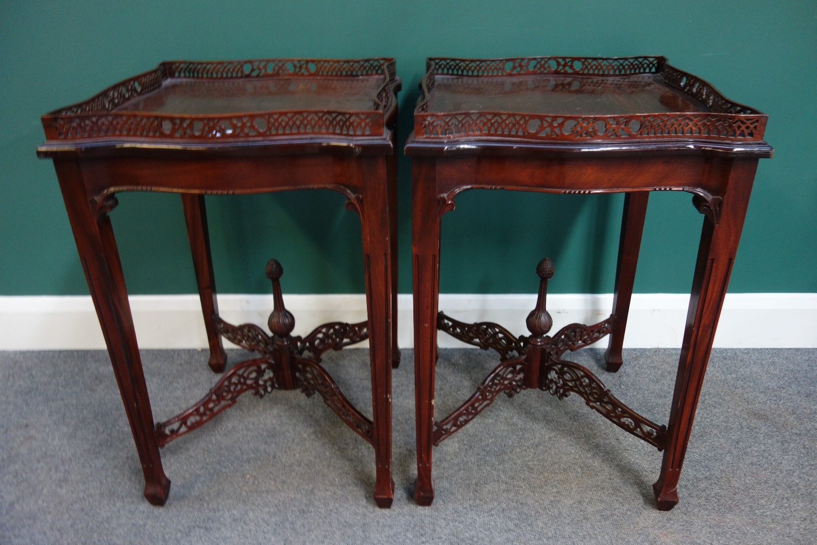 Appraisal: A pair of th century style mahogany pierced tray top