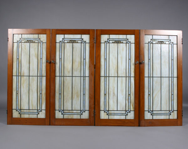 Appraisal: Four Arts and Crafts leaded glass doors caramel slag blue