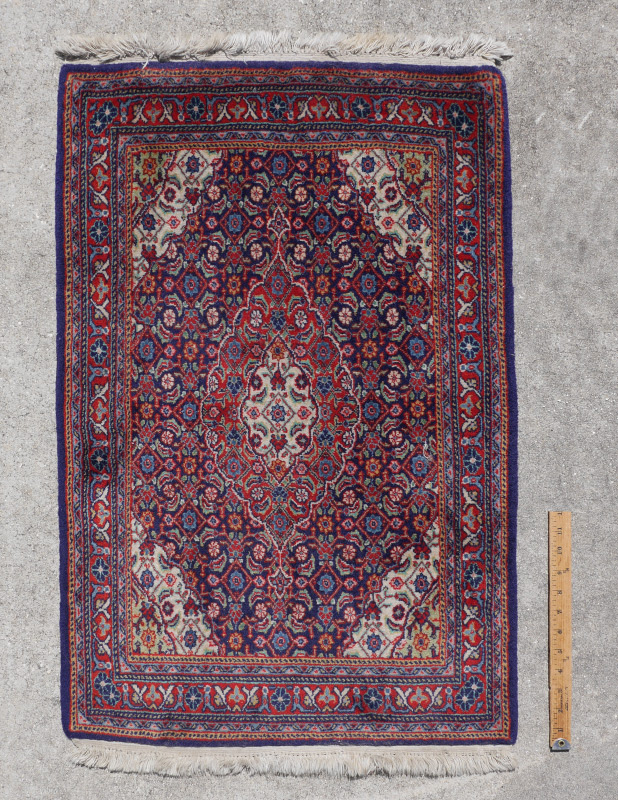 Appraisal: APPROX - YR OLD TURKISH HEREKE HAND KNOTTED WOOL RUG