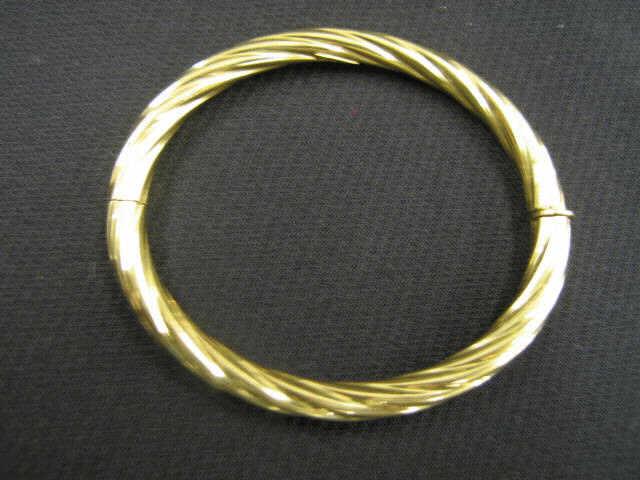 Appraisal: k Gold Bracelet cable style yellow gold hinged bandle grams