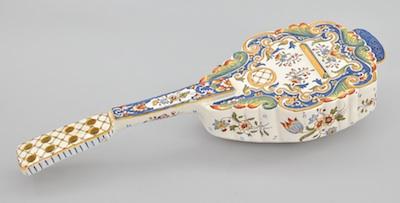 Appraisal: A Faience Mandolin Form Wall Pocket Decorated with a floral