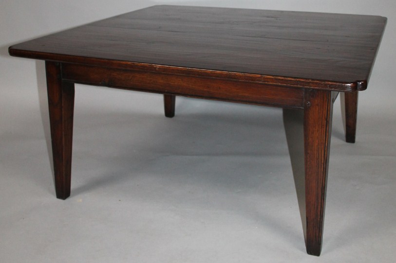 Appraisal: A low table probably made from thC timbers the shaped