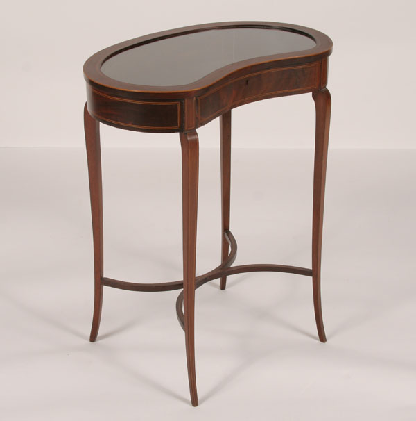 Appraisal: Kidney-shape glass top display table inlaid string banding tapered legs