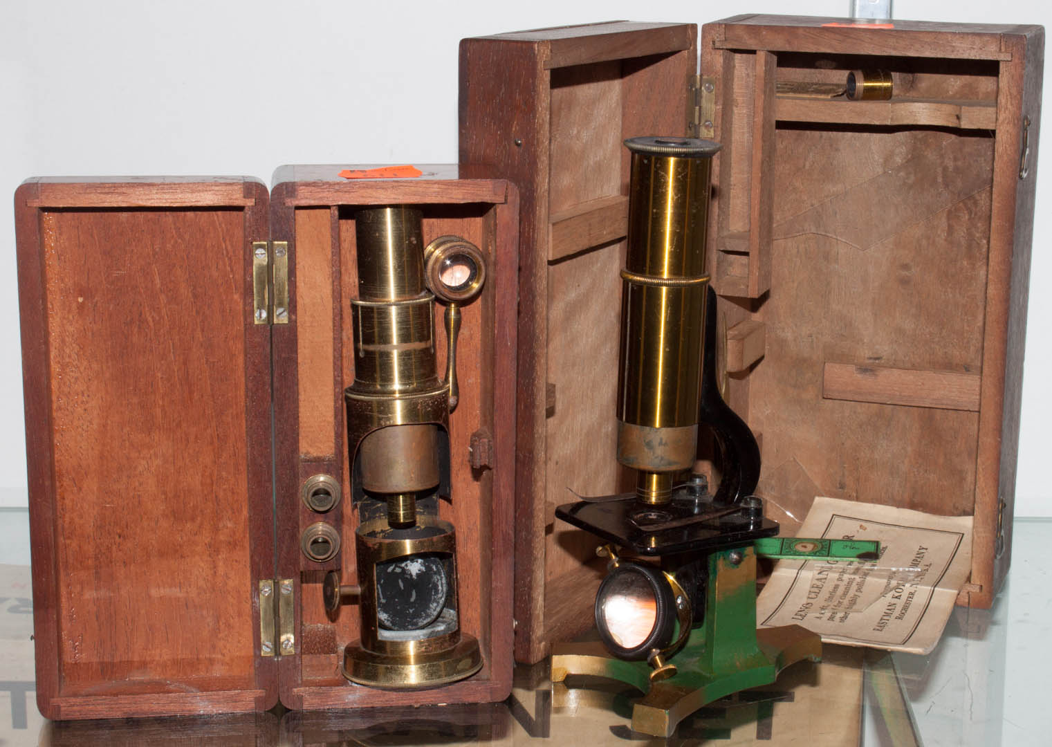 Appraisal: Two early brass microscopes with boxes early th century both