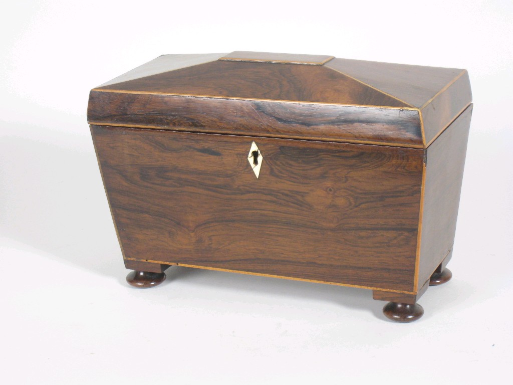 Appraisal: A th Century rosewood Tea Caddy of sarcophagus form with