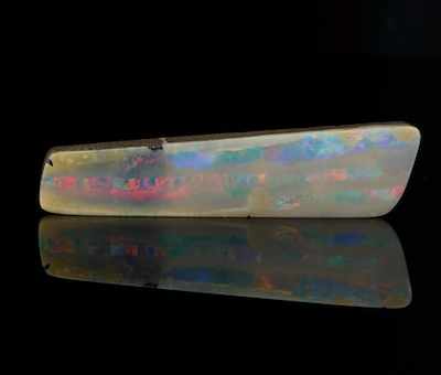 Appraisal: An Unmounted Boudler Opal Fragment Of elongated form white opal