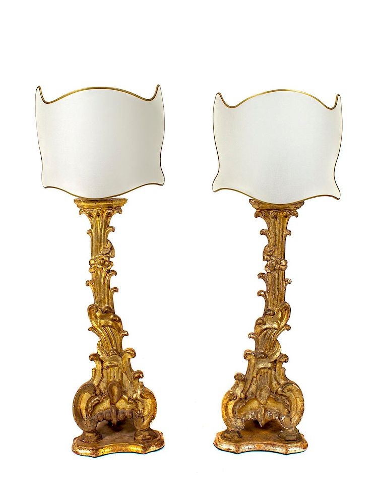 Appraisal: A Pair of Italian Carved Giltwood Pricket Sticks Height with