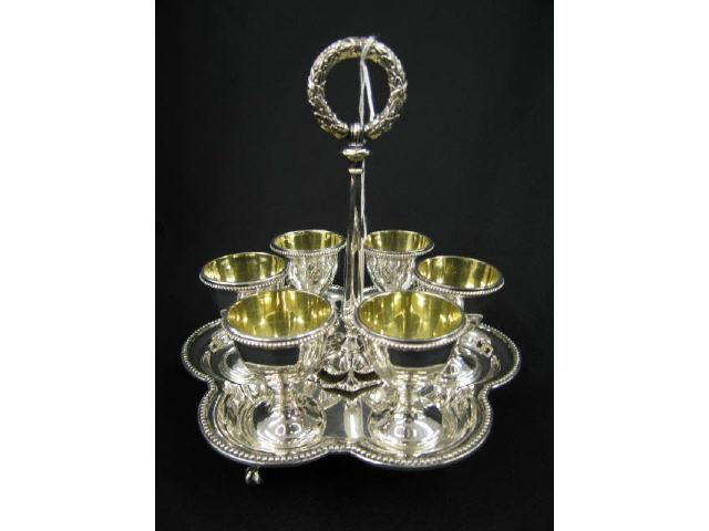 Appraisal: Elkington Victorian Silverplate Egg Holder Set cups with pedestal bases