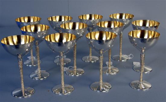 Appraisal: Stuart Devlin set of twelve silver crocus pattern wine goblets