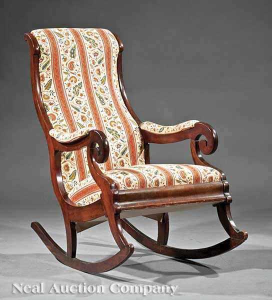 Appraisal: An American Mahogany Lincoln Rocker th c scrolled back and