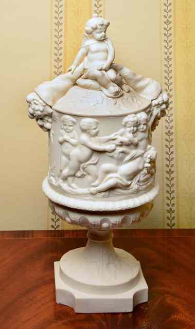 Appraisal: A COPELAND PARIAN WARE VASE AND COVER surmounted by a