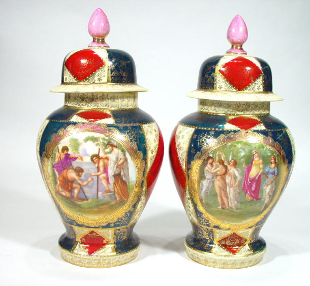 Appraisal: Pair of Vienna porcelain baluster vases and covers decorated with