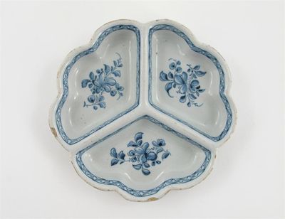 Appraisal: A Delftware blue and white sweetmeat dish divided into three