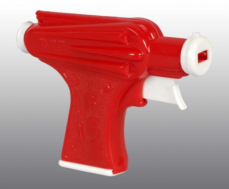 Appraisal: Pez Space Gun Shooter Description Circa s Red in color