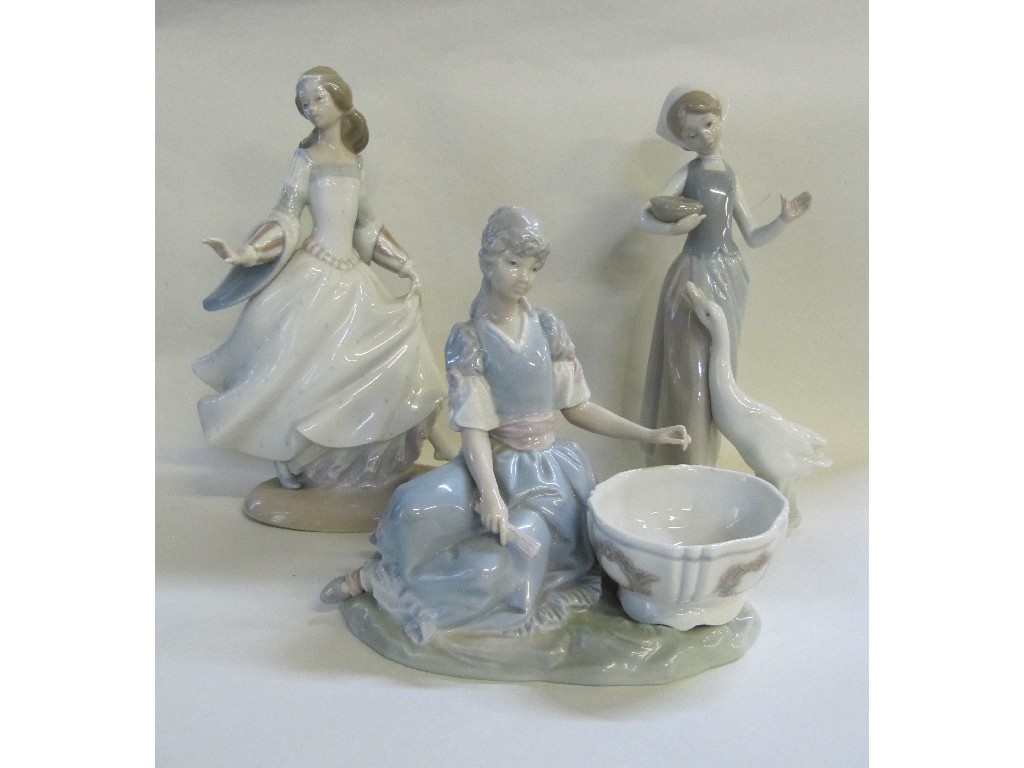 Appraisal: Three Lladro figures to include Cinderella seated girl with basket