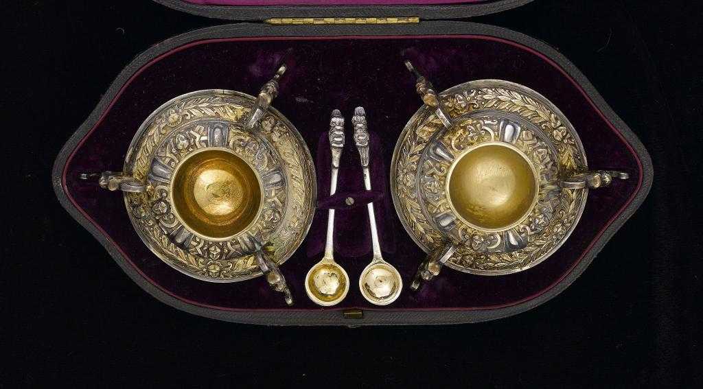 Appraisal: A PAIR OF VICTORIAN SILVER GILT SALT CELLARS cast and