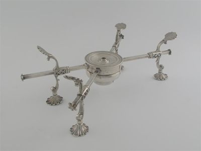 Appraisal: A George III adjustable dish cross on fluted feet with