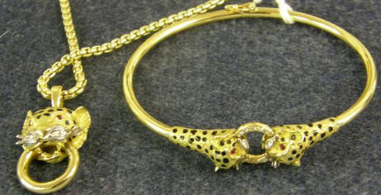 Appraisal: A YELLOW METAL LEOPARD'S HEAD DIAMOND SET AND ENAMELLED PENDANT