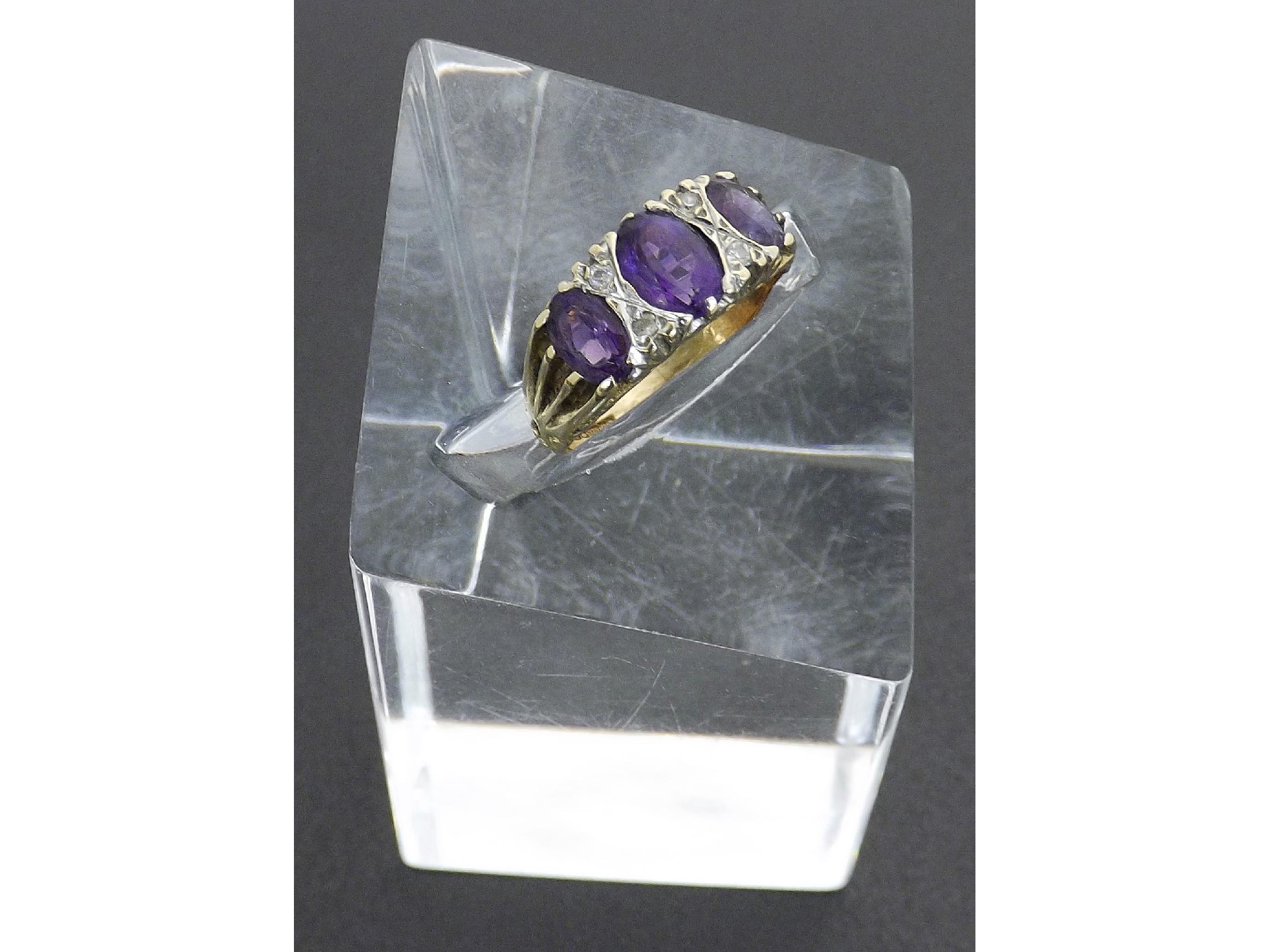 Appraisal: ct amethyst and stone claw set ring ring size M