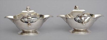 Appraisal: PAIR OF ENGLISH SILVER TWO-HANDLED SAUCE BOATS Charles Richard Comyns