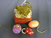 Appraisal: DOLL PURSE WITH EGGS Doll purse is red with gold