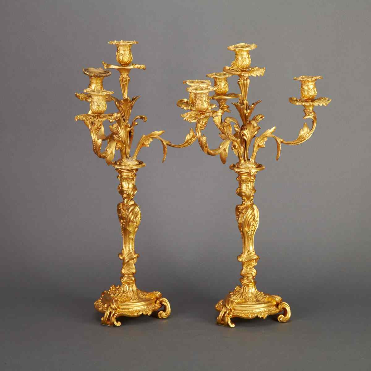 Appraisal: Pair of Louis XV Style Gilt Bronze Four Light Candelabra