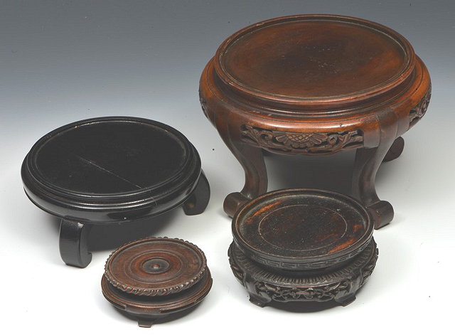 Appraisal: FOUR CHINESE CARVED HARDWOOD BOWL STANDS