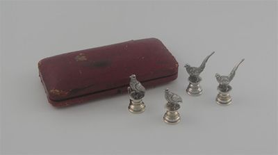 Appraisal: A set of four cast game bird menu holders set