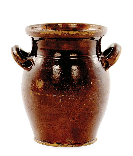 Appraisal: North Carolina Moravian storage jar Winston-Salem North Carolina circa manganese-glazed