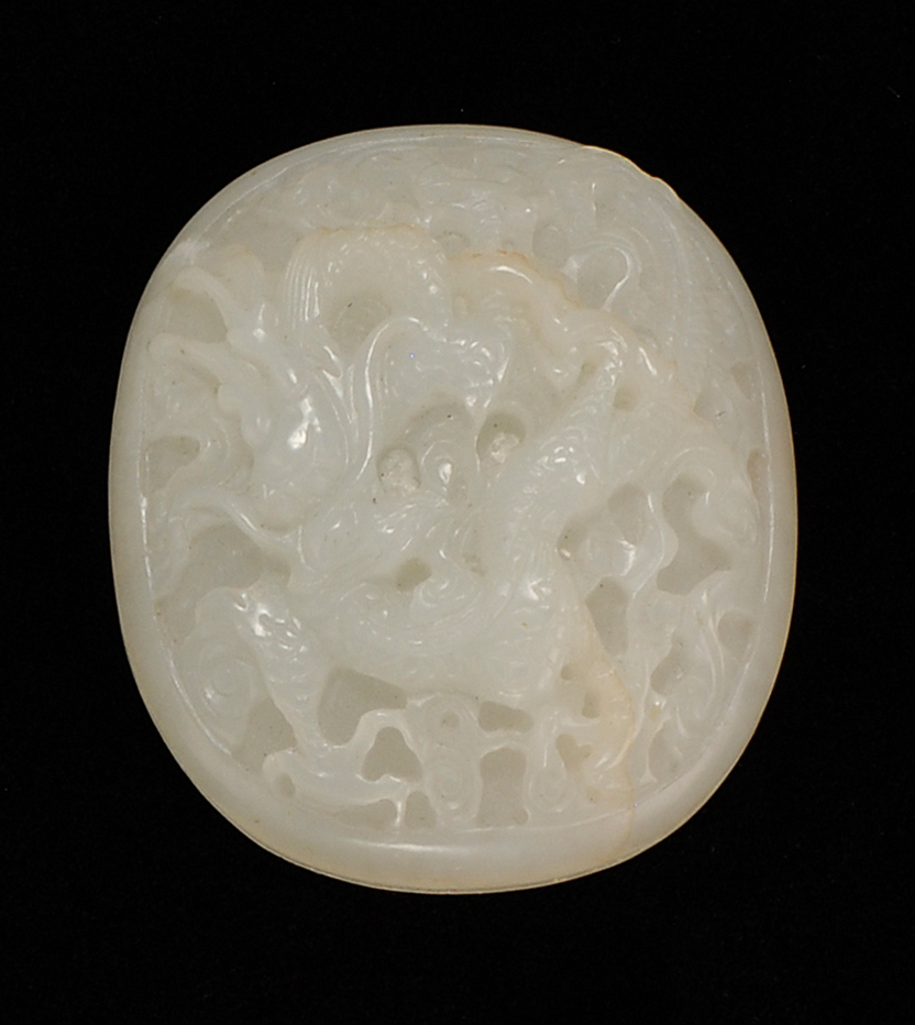 Appraisal: WHITE JADE PLAQUE th CenturyIn oval form with relief dragon