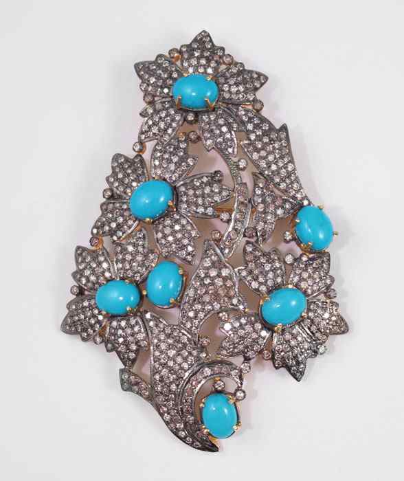 Appraisal: CTW DIAMOND SLEEPING BEAUTY TURQUOISE BROOCH PENDANT K yellow gold