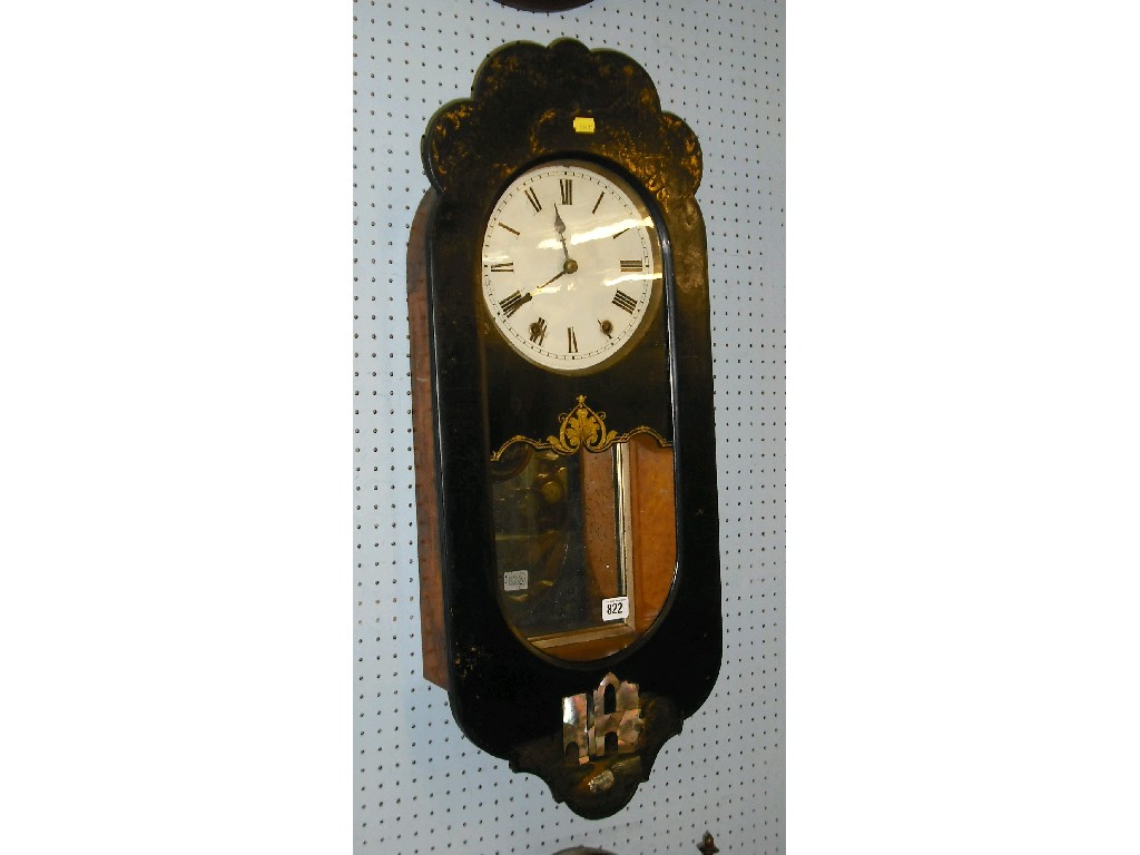 Appraisal: American walnut and ebonised two train wall clock the movement