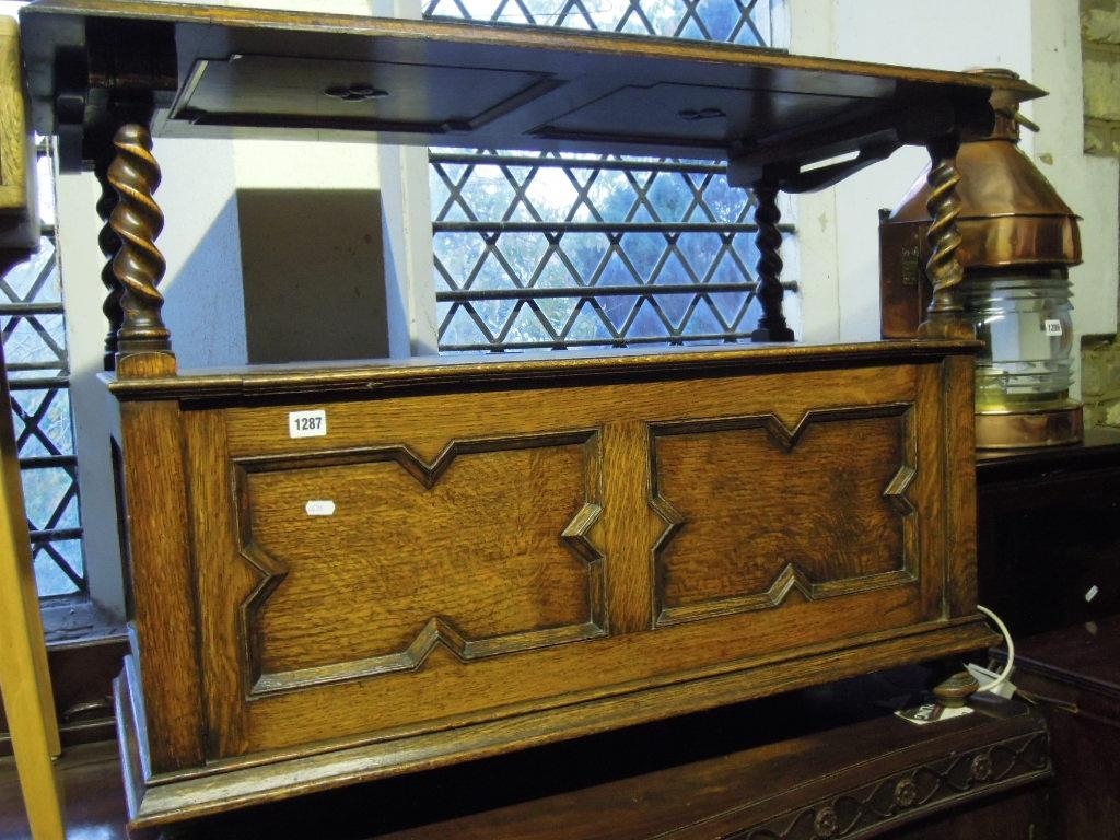 Appraisal: An Edwardian 's oak monks bench of usual form with