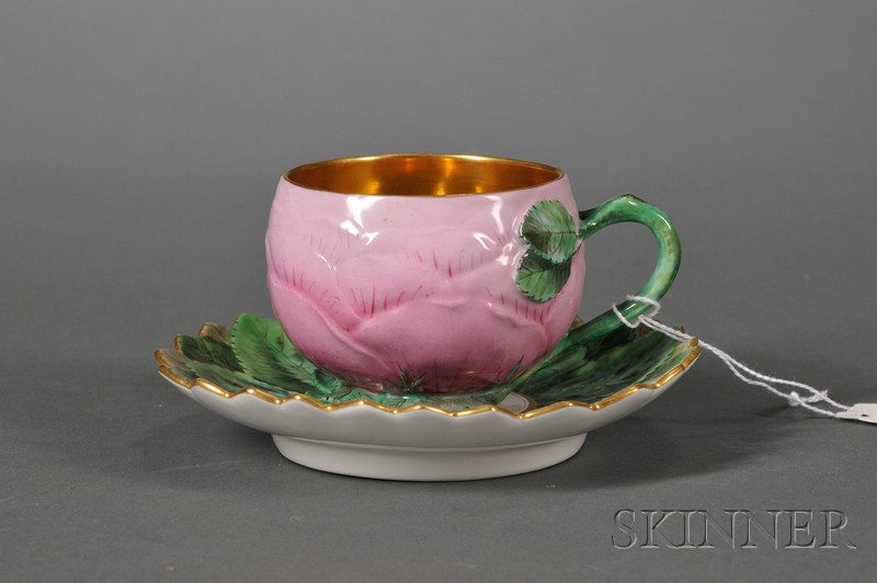 Appraisal: KPM Porcelain Floriform Cup and Saucer th century the ovoid