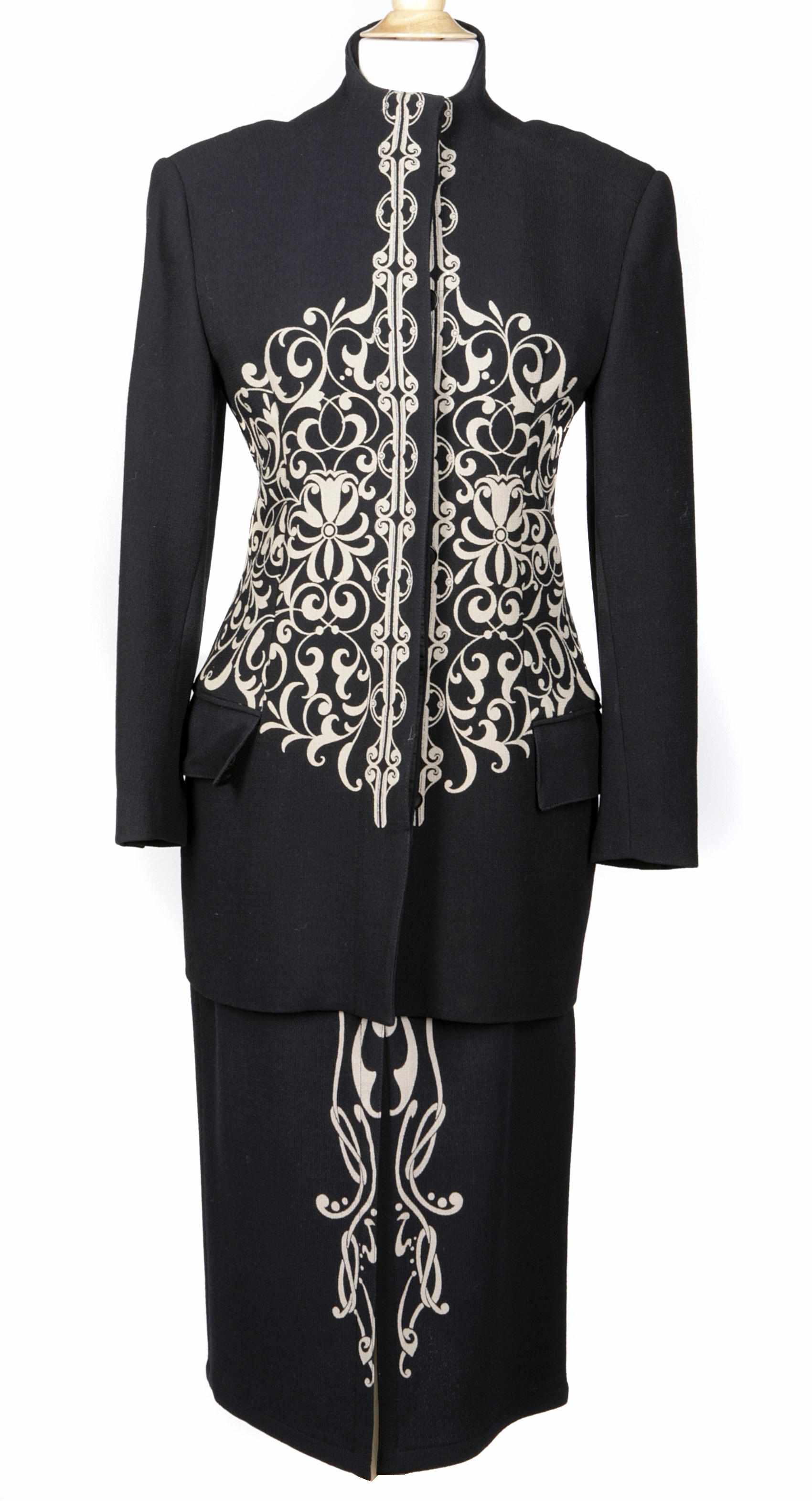 Appraisal: A Gianni Versace black and tan jacket and skirt suit