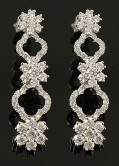 Appraisal: A pair of diamond drop earrings Comprising one hundred and