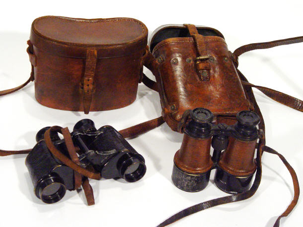 Appraisal: Pair of French leather gripped binoculars in a military leather