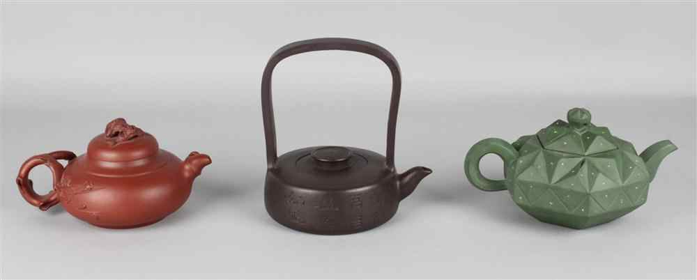 Appraisal: THREE CHINESE SIGNED YIXING TEAPOTS including a brown pot of