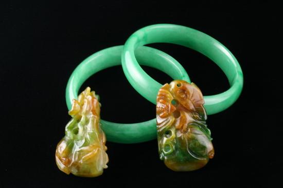 Appraisal: FOUR PIECES CHINESE JADE JEWELRY Including two apple green color