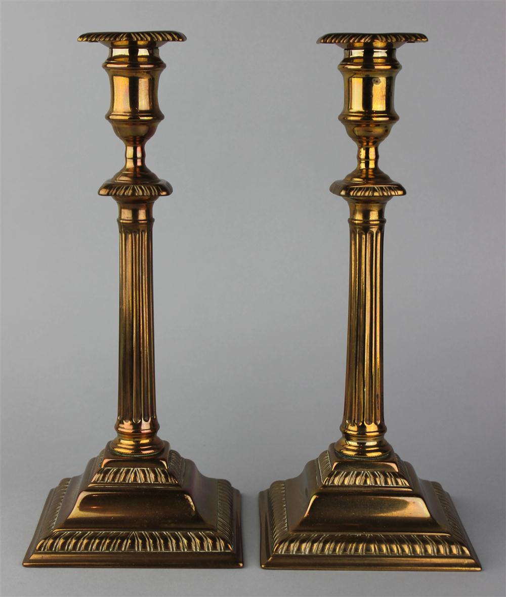 Appraisal: PAIR OF GEORGE III STYLE BELL METAL COLUMNAR CANDLESTICKS th