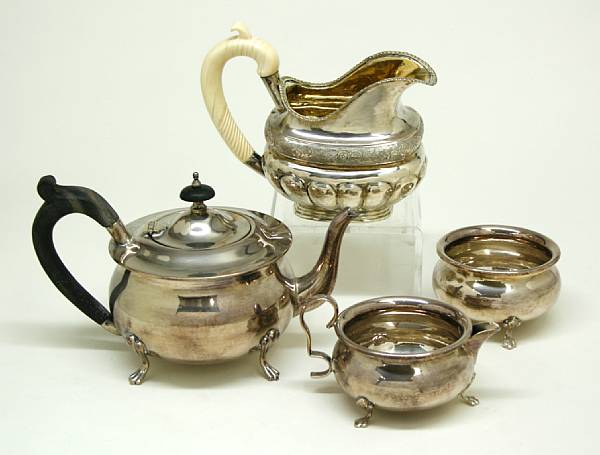 Appraisal: A Russian standard silver cream pitcher with carved ivory handleA