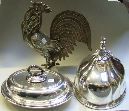 Appraisal: A plated shaped oval meat dome a plated oval lidded